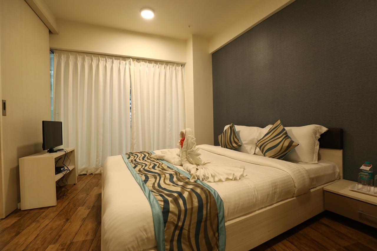 Rajhans Belliza Service Apartment สุรัต ภายนอก รูปภาพ